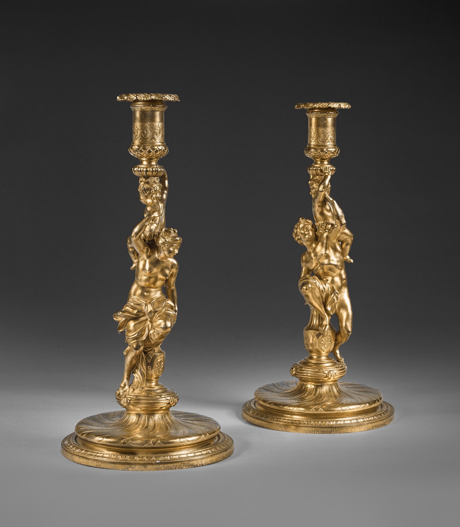 UNE PAIRE DE FLAMBEAUX LOUIS XIV